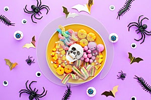 Halloween holiday sweet candy treats, top down view