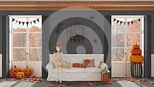 Halloween interior design, living room with skeleton sitting on the sofa in dark tones.Panoramic windows on autumnal landscape.
