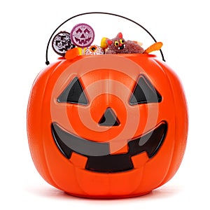 Halloween Jack o Lantern candy pail over white