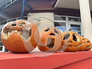 Halloween Jack o\'lanterns pumpkins in a row