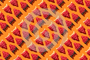 Halloween jelly beans devil orange seamless pattern