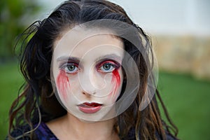 Halloween kid girl custome bloody makeup photo