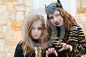 Halloween kid girls costume scaring gesture