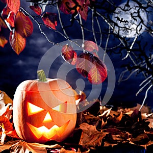 Halloween lantern pumpkin in dark sky clouds