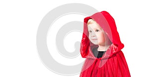 Little Red Riding Hood. Beautiful little girl in a red raincoat. Halloween