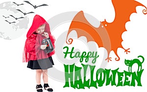 Halloween. Little Red Riding Hood. Beautiful little girl in a red raincoat.