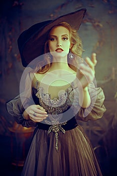 Enchanting female magician photo