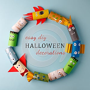 Halloween monsters doll from toilet paper tube roll. Creative easy DIY decorations for kids. Home decor for party. Paper handie