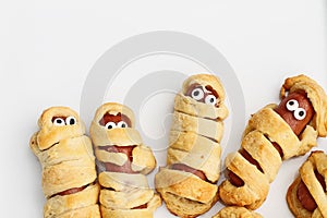 Halloween Mummy Hot Dogs Wrapped in Croissant Rolls