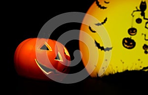 Halloween night background with scary moon and bat and pumpkin