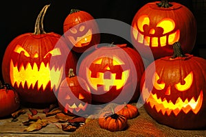 Halloween night scene with a group of Jack o Lanterns
