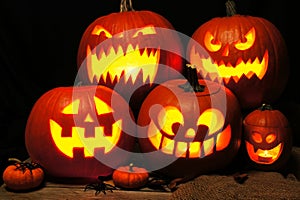Halloween night scene with spooky Jack o Lanterns