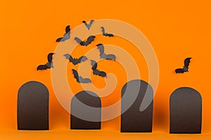 Halloween orange background with blank black sale labels and bats flock, mock up.