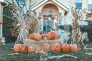 Halloween outdoor pumpkin decorations in front of house yard