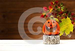 Halloween party background. Podium or pedestal for products display and Funny Pumpkin.