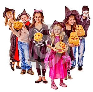 Halloween party with group kid holding carving