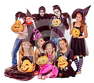 Halloween party with group kid holding carving