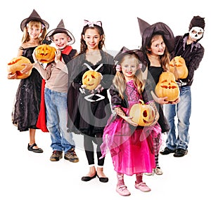 Halloween party with group kid holding carving pumpkin.