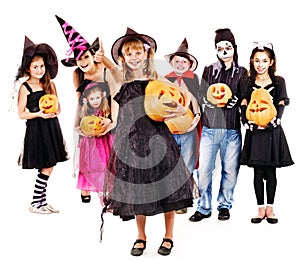 Halloween party with group kid holding carving pumpkin.