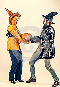 Halloween poster or greeting card - people concept. Halloween Party couple. Full length.