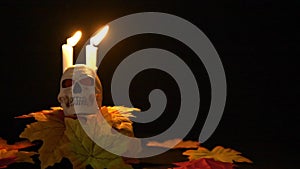 Halloween prop skul and candle on black background animation