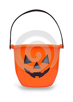 Halloween pumpkin bucket isolated on white background clipping path for kid collecting candy in Jack o`lantern basket