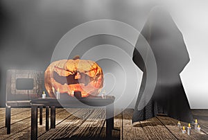 Halloween pumpkin candle lights at wooden planks with deep fog 3 photo