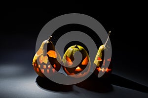 Halloween pumpkin on dark background on holiday, three different pumpkin backgrounds wallpaper