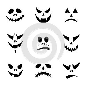 Set of Halloween pumpkin faces icons. Scary faces isolated on white background. Vector illustration, flat style.