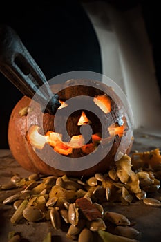 Halloween pumpkin glows and is cut by itself on holiday