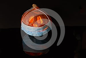 Halloween pumpkin head lantern on black background. Jack-o-lantern carved pumpkins for Halloween close up. idea for halloween 2020