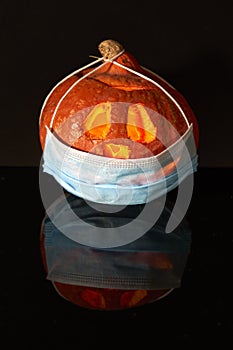 Halloween pumpkin head lantern on black background. Jack-o-lantern carved pumpkins for Halloween close up. idea for halloween 2020