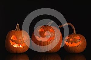 Halloween pumpkin heads. Glowing jack lanterns