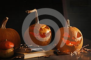 Halloween pumpkin heads. Jack lanterns on windowsill