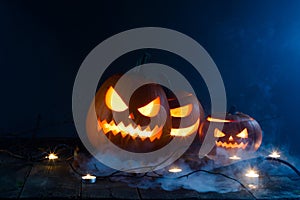 Halloween pumpkin lantern in mist