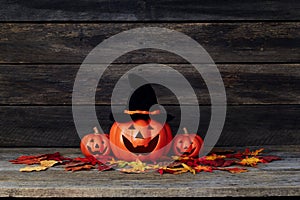 Halloween pumpkin lantern. Trick or treat on a wooden table