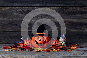 Halloween pumpkin lantern. Trick or treat on a wooden table