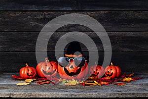 Halloween pumpkin lantern. Trick or treat on a wooden table