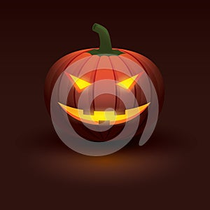 Halloween pumpkin with light glowing in smiling face on dark background.