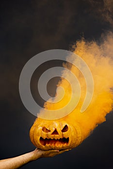 Halloween pumpkin With orange Smoke