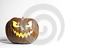 Halloween Pumpkin with Paper Cut Scary Face on a White Background. Jack Halloween. Smile Jack Pumpkin