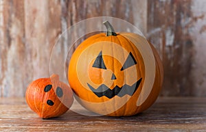 Halloween pumpkin and squash on wooden background