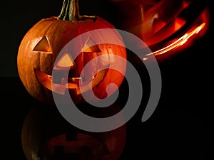 Halloween pumpkins on black background