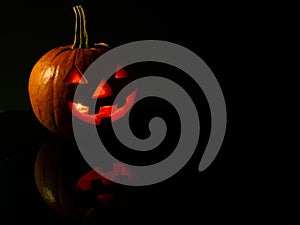 Halloween pumpkins on black background