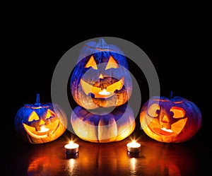 Halloween pumpkins glowing inside