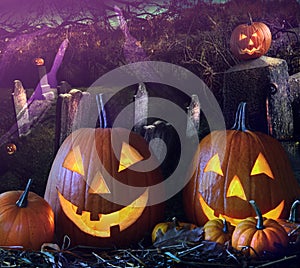 Halloween pumpkins in the grave yard