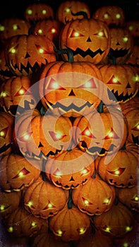 Halloween pumpkins with luminous eyes in the dark.