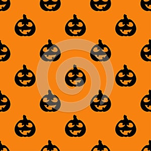 Halloween pumpkins seamless pattern. Black silhouette halloween pumpkin on orange background. Halloween background with carving