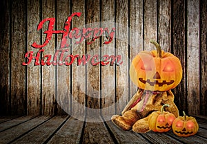 Halloween Pumpkins on wood background with message 'Happy Halloween'