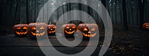 Halloween Pumpkins On Wood In A Spooky Forest At Night